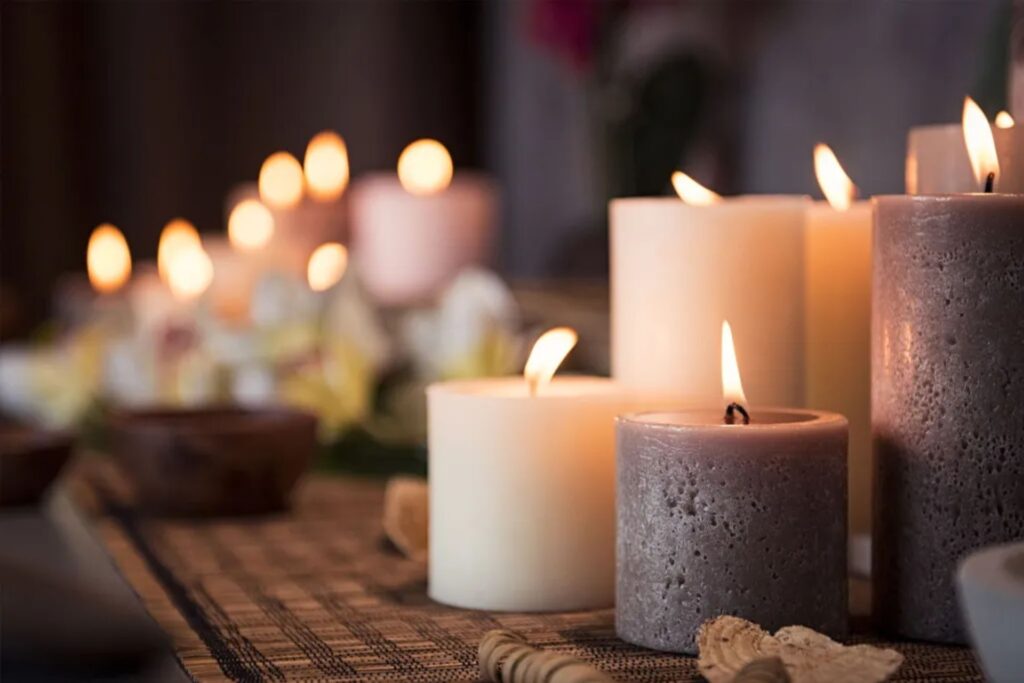 Lighted Candles On A Table