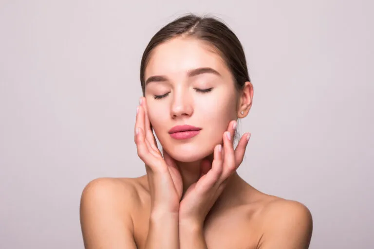 Girl Showing Her Skin After Facial Treatment